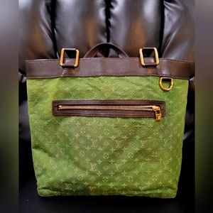 Louis Vuitton 100% authentic LUCILE CLOTH HANDBAG in great condition